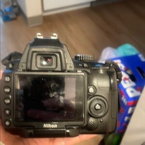 Nikon Black Digital Camera with LCD Screen and Manual Controls